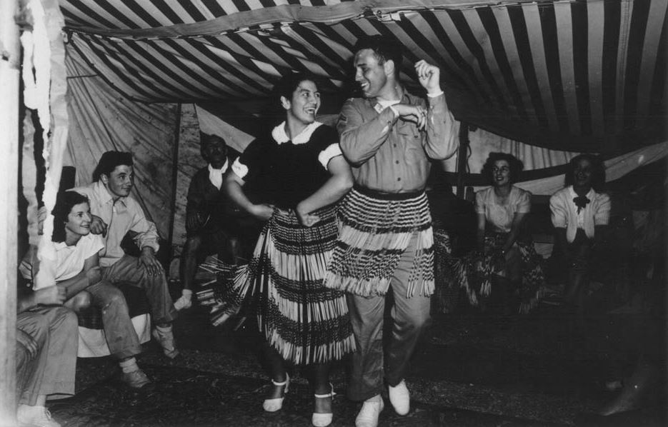 Norm Hatch is taught how to dance by Peggy Kaua at Gisborne, Christmas 1942. Source: NZ History